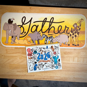 Calendar with animal illustrations and a decorative wall decal 